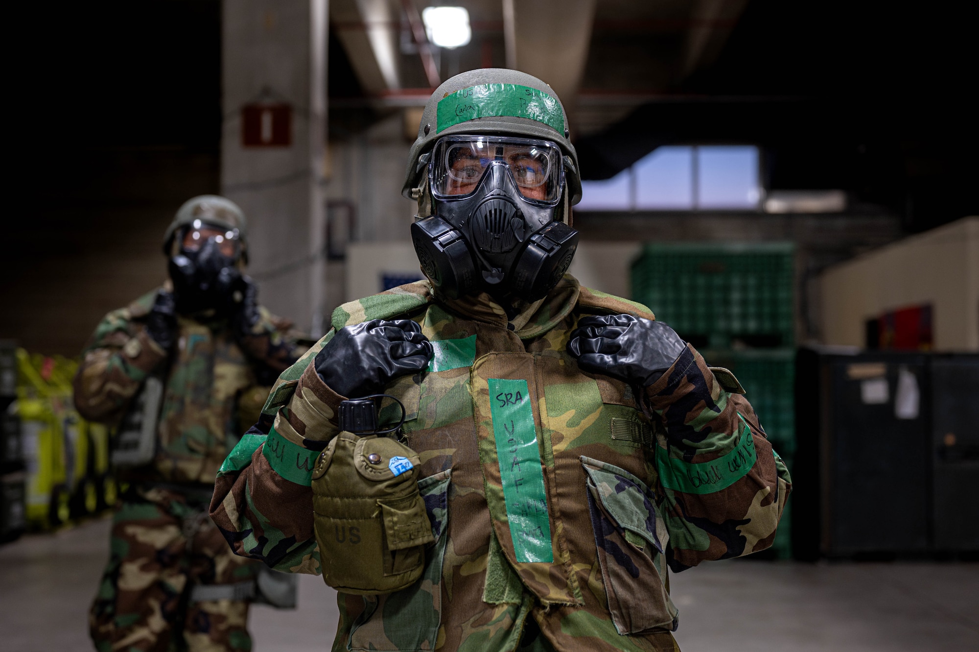 U.S. Air Force Senior Airman Carla Byrd, 18th Dental Squadron periodontal dental technician, poses in full mission oriented protective posture gear during a chemical, biological, radiological and nuclear defense course at Kadena Air Base, Japan, Sept. 4, 2025. MOPP gear is layered protective equipment that service members wear to protect their skin and lungs from toxic agents. (U.S. Air Force photo by Airman Nathaniel Jackson)
