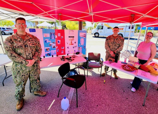 Pictured: Lt. j.g. Victor Torrico, industrial hygiene officer (left), Lt. Jake Odom, physical therapist (center), and Public Health Specialist Tanya Stuckey (right) of Naval Hospital Twentynine Palms at the Emergency Preparedness and Suicide Awareness Event Sept. 10. The hospital provided active-duty service members, their families and civilian personnel with resources and education on mental health, suicide prevention and emergency preparedness, emphasizing the importance of resilience, readiness and a culture of mutual support across the Marine Corps Air Ground Combat Center community (Courtesy Photo).