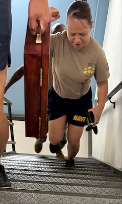 Taking it to the top, one step at a time…Chief Hospital Corpsman Rose Hendricks participates in the 9/11 Stair Climb Challenge held September 11, 2025, at Naval Hospital Bremerton and coordinated by Navy Medicine Readiness Training Command Bremerton chief petty officer selects. The event was held in conjunction with a somber 9/11 remembrance ceremony throughout the morning and focused on providing a step-by-step homage opportunity in honor of those 343 firefighters, eight emergency medical services personnel, 72 law enforcement officers and other first responders who lost their lives responding to the terrorist attack on the World Trade Center office towers that fateful day 24 years ago (Official Navy photo by Douglas H Stutz, NHB/NMRTC Bremerton public affairs officer).
