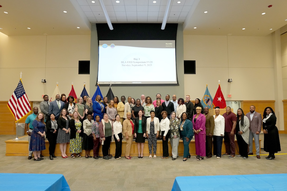 Participants of the Defense Logistics Agency Equal Employment Opportunity Symposium 2025 pose for a group photo at Troop Support in Philadelphia. DLA Chief of Staff Karyn Runstrom and DLA EEO Director Janice Samuel provided opening remarks at the event. Photo taken by: Ed Maldonado