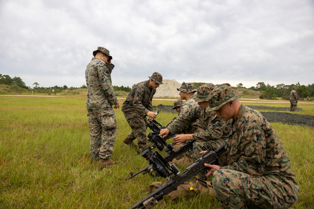U.S. Marines with 2nd Battalion 2nd Marine Regiment, clean their M240B in preparation for a medium machine gun range, as part of Exercise UNITAS 2025, at Marine Corps Base Camp Lejeune, North Carolina, Sep. 14, 2025. UNITAS, which is Latin for “unity,” was conceived in 1959 and has taken place annually since first conducted in 1960. This year marks the 66th iteration of the world’s longest running annual multinational maritime exercise. (U.S. Marine Corps photo by Lance Cpl. Payton Goodrich)