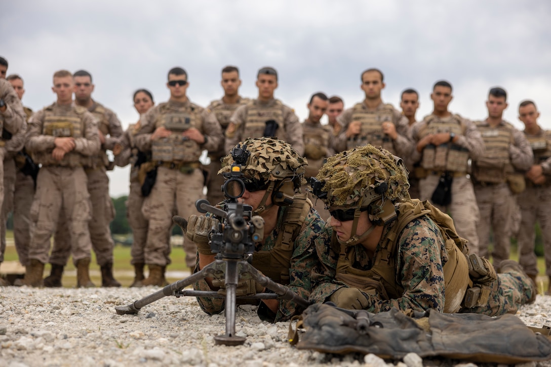 U.S. Marine Corps Lance Cpl. Walker Dixon, and Sgt. John Aguilar, with 2nd Battalion 2nd Marine Regiment, demonstrate proper use of the M240B to members of the Infantería de Marina (Spanish marine corps) during a medium machine gun range as part of UNITAS 2025 taking place on Marine Corps Base Camp Lejeune, North Carolina, Sep. 12, 2025. UNITAS, which is Latin for “unity,” was conceived in 1959 and has taken place annually since first conducted in 1960. This year marks the 66th iteration of the world’s longest running annual multinational maritime exercise. (U.S. Marine Corps photo by Lance Cpl. Payton Goodrich)