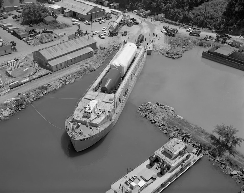 The stages of the Saturn I are loaded Aug. 5, 1961, onto the barge, Compromise, to complete the journey from Marshall to Cape Canaveral for final assembly and launch of the first Saturn. (Photo courtesy of NASA)