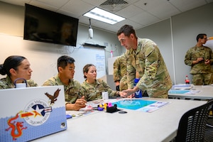 Officer Trainees prepare for a Mission Command pre-brief,