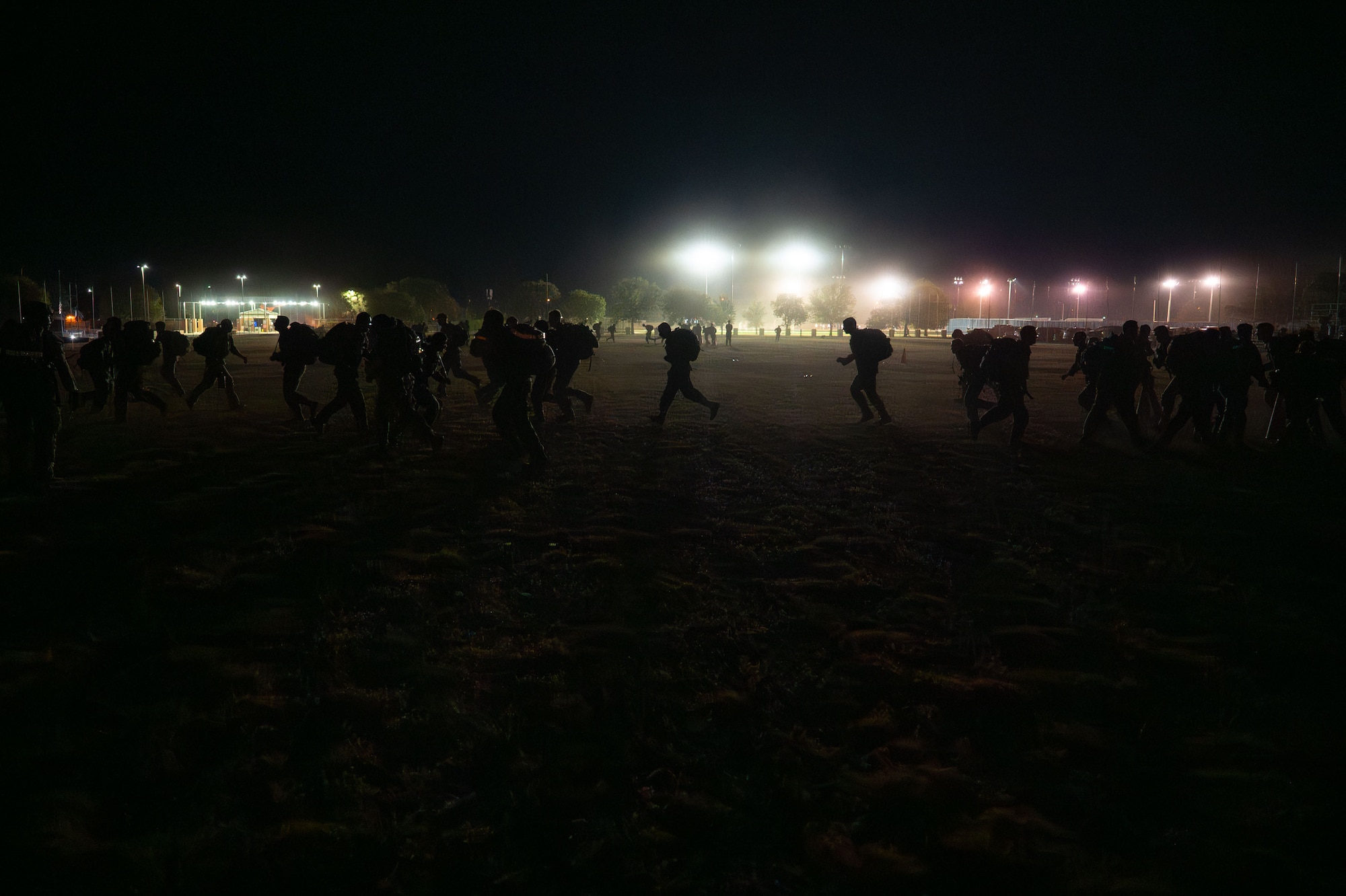 Army soldiers attached to the 344th Military Intelligence Battalion participate in sprints during the 9/11 Memorial Physical Training Event