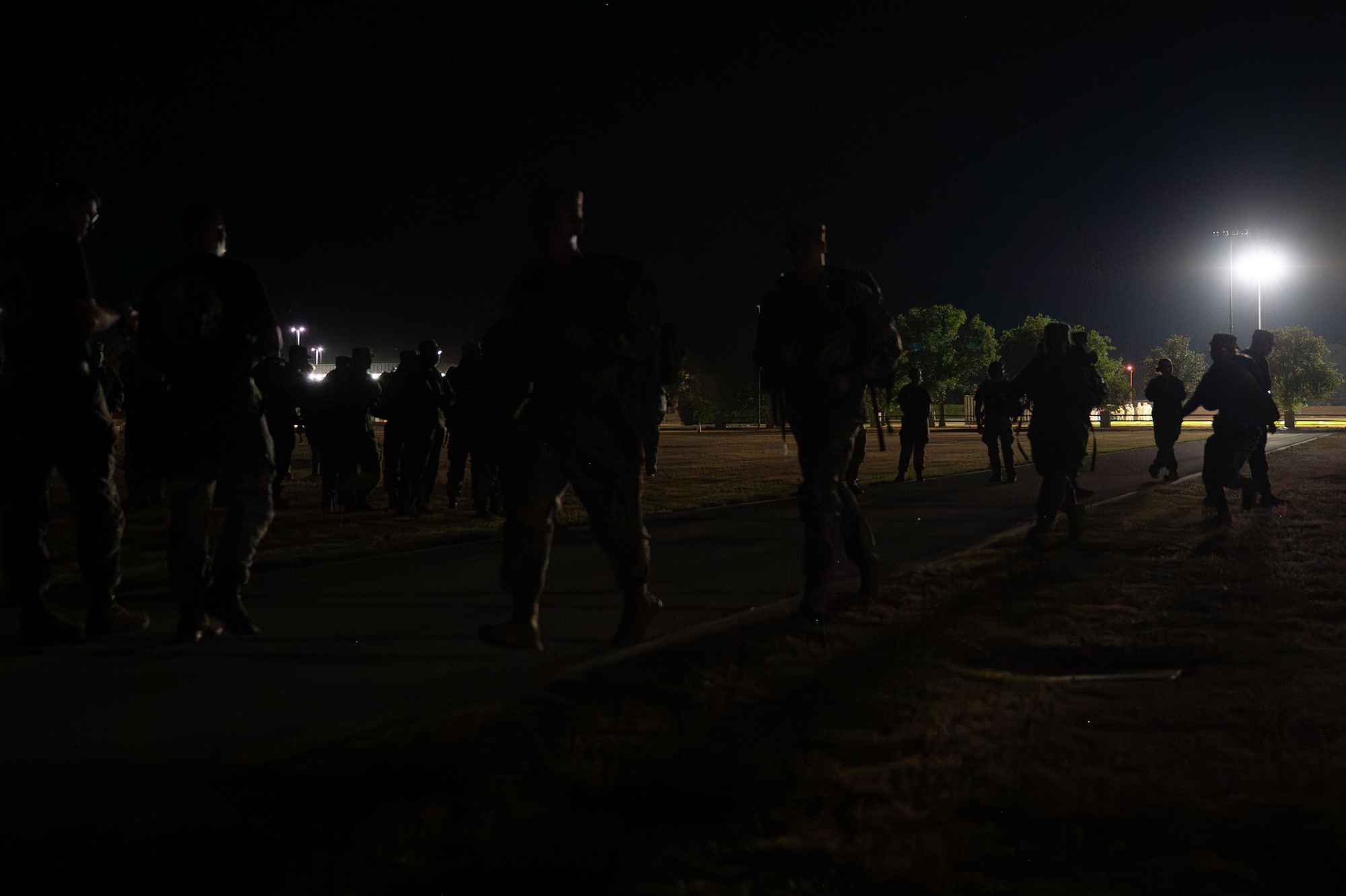 U.S. Army soldiers attached to the 344th Military Intelligence Battalion form up for a ruck during the 9/11 Memorial Physical Training Event at Goodfellow Air Force Base