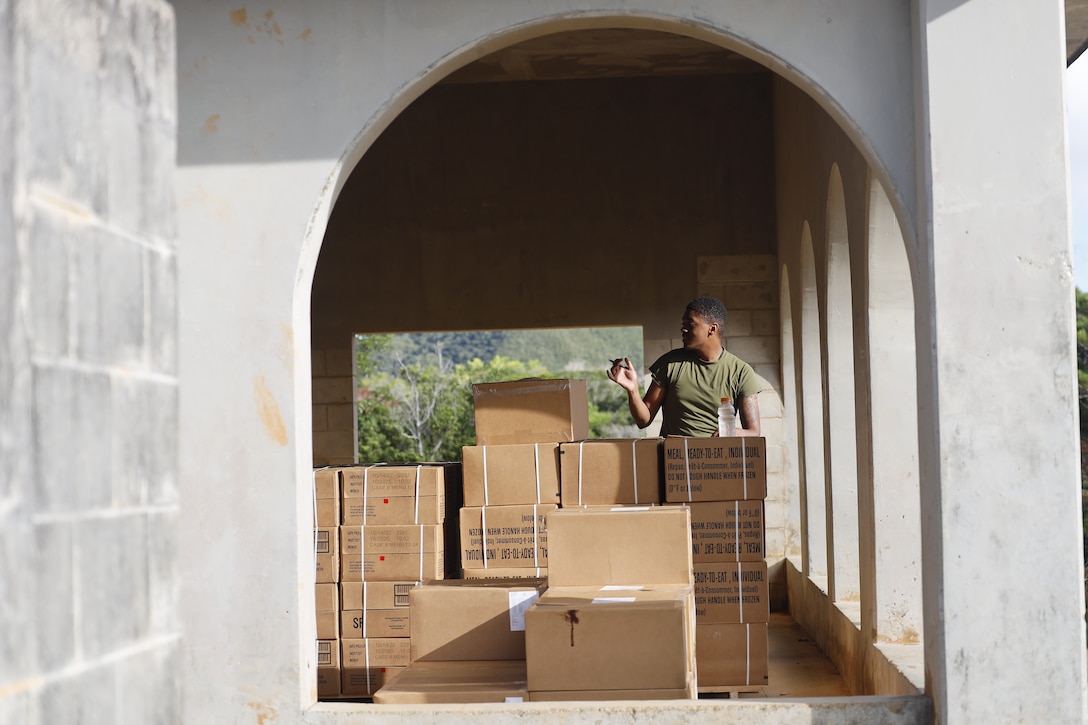 U.S. Marine Corps Cpl. Sean Harris, a food service specialist with III Marine Expeditionary Force, Information Group, takes stock of food supplies at the III MEF combat operations center in Combat Town, Camp Hansen, Okinawa Japan, Sept. 13, 2025, during the Command Post Exercise portion of Resolute Dragon 25. Resolute Dragon 25 is an annual bilateral exercise across Japan, including the southwest islands, that strengthens the command, control and multidomain maneuver capabilities of III MEF and the Japan Ground Self-Defense Force’s Western Army personnel, alongside representatives across the U.S. and Japanese Joint Force, with a focus on controlling and defending key maritime terrain. Harris is a native of Indiana. (U.S. Marine Corps photo by Gunnery Sgt. Daniel Wetzel)