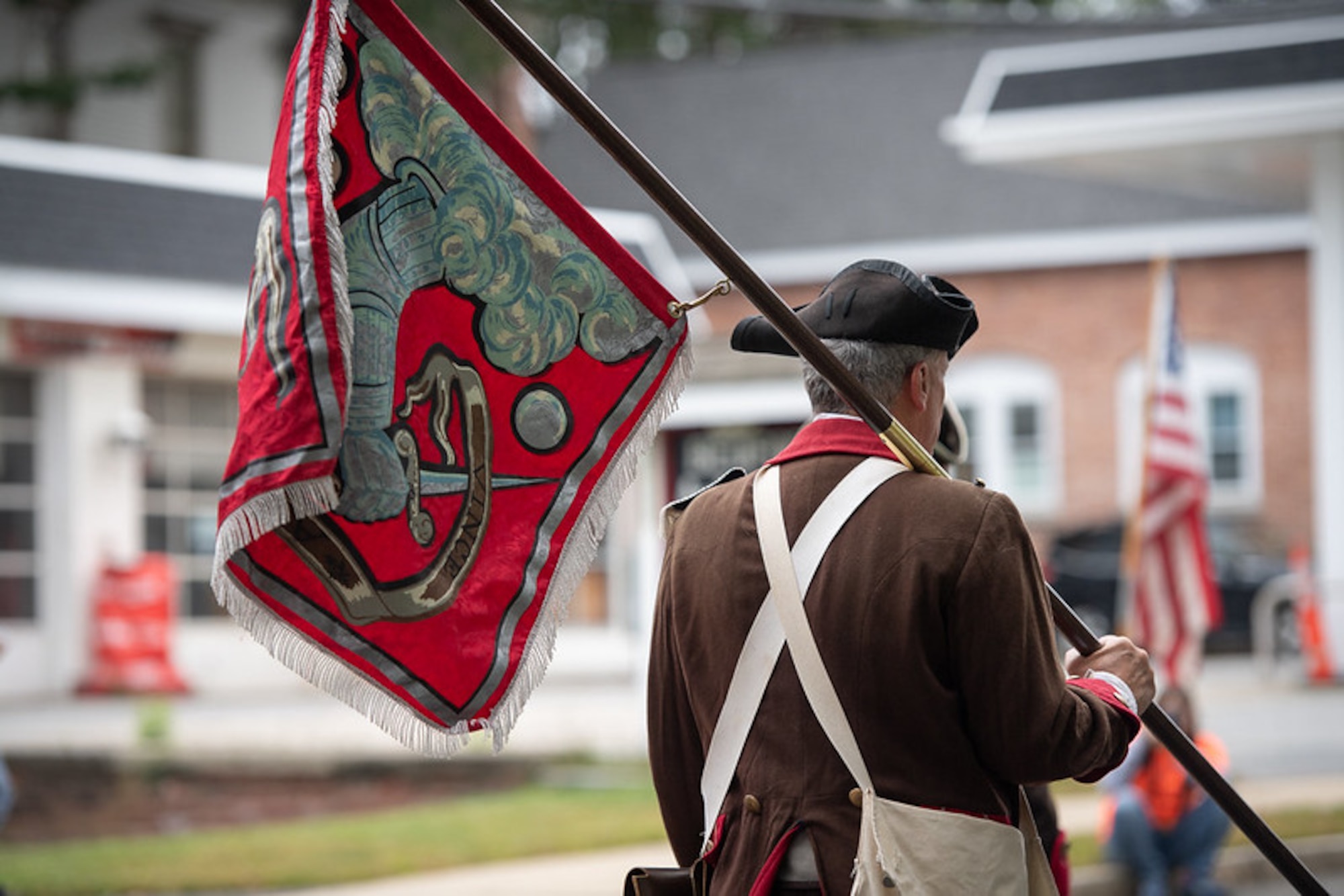 Bedford Minuteman carries the Bedford town flag.