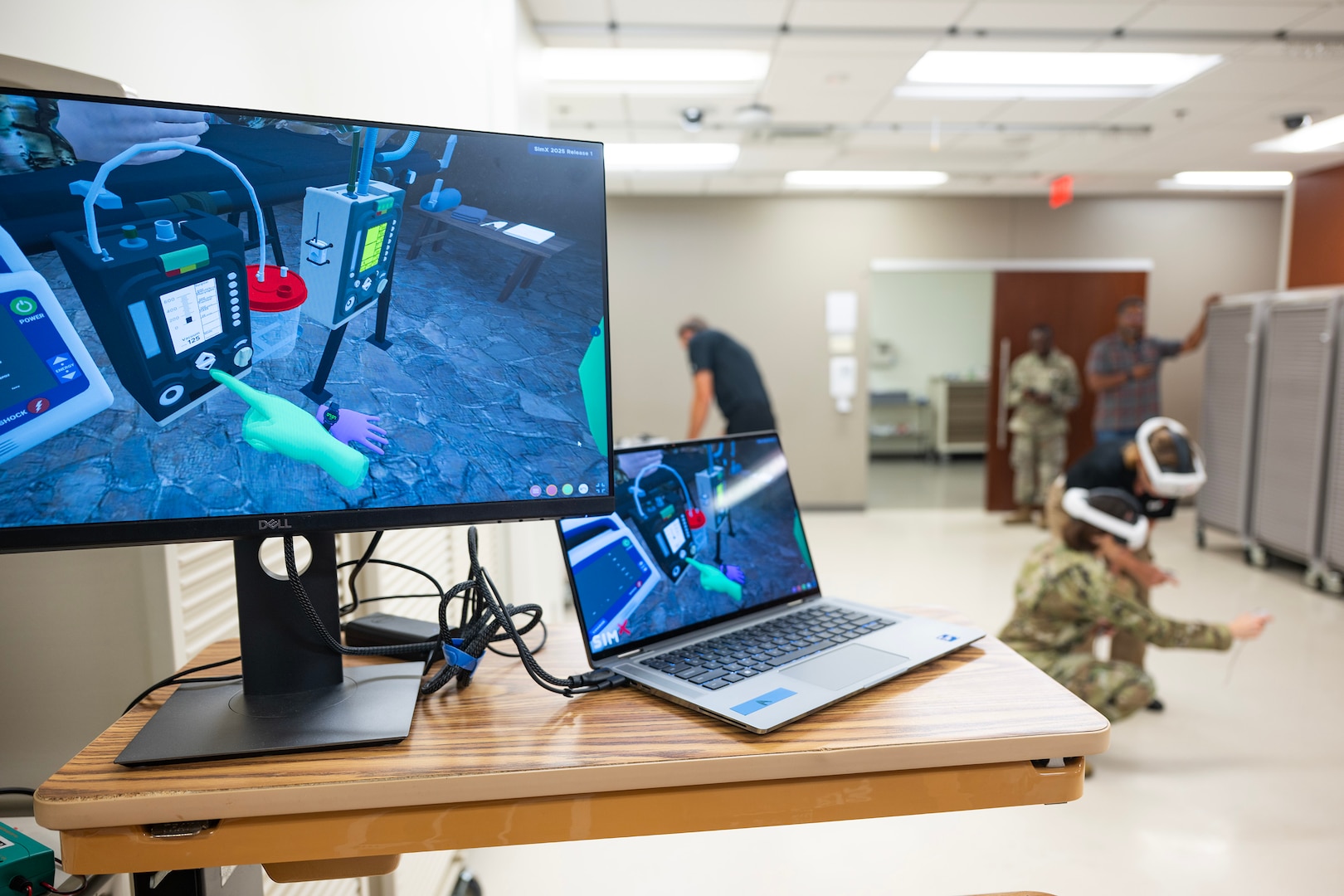 A display shows the virtual environment during a demonstration of SimX’s Virtual Reality Operational Medical Training at Wilford Hall Ambulatory Surgical Center, Joint Base San Antonio-Lackland, Texas, Sept. 5, 2025.