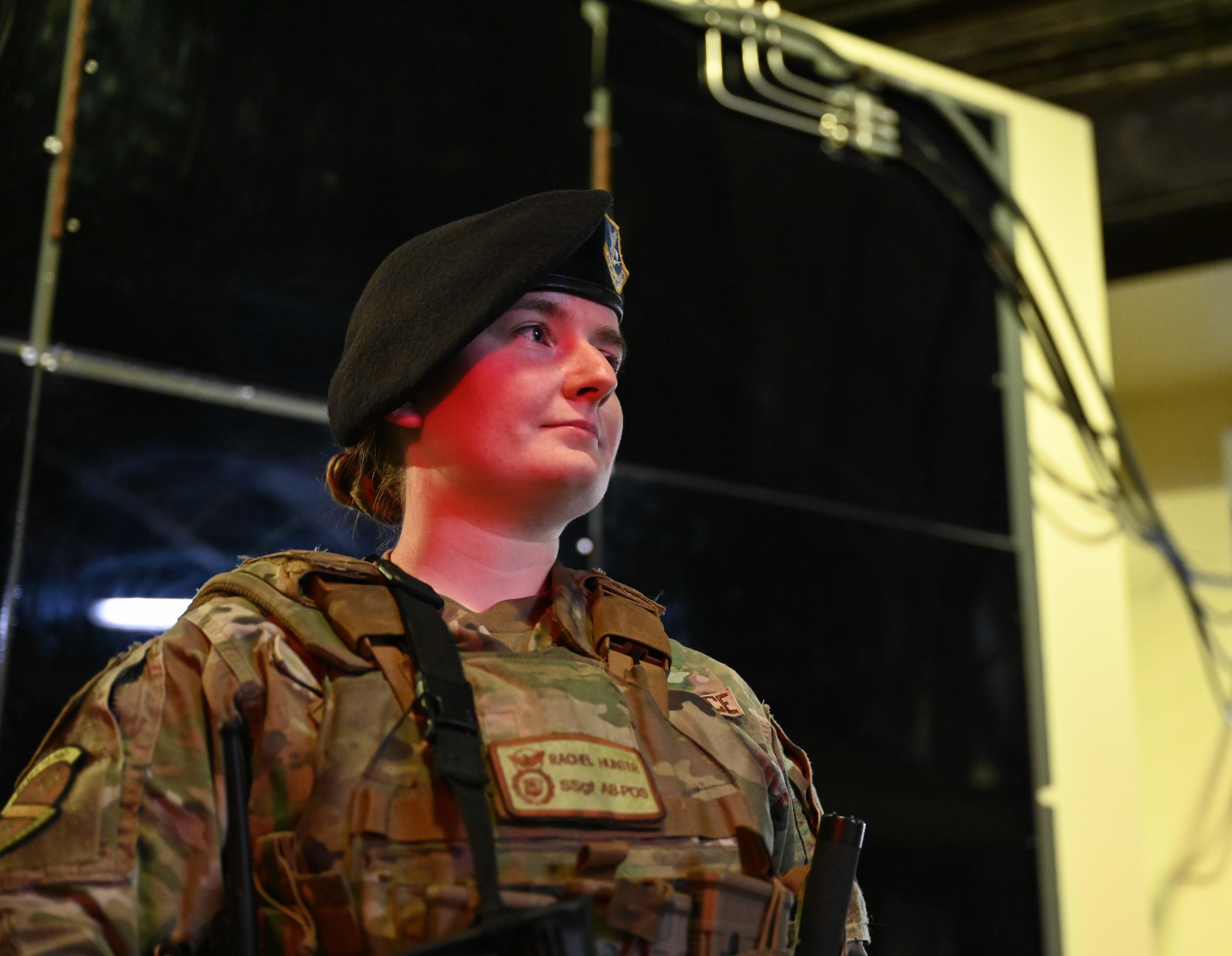 Staff Sgt. Rachel Hunter poses for a photo in front of a blast door.