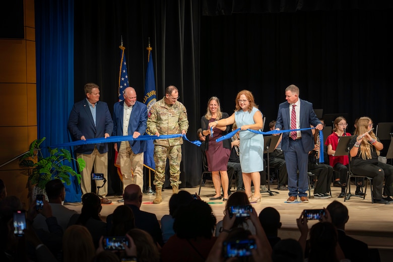 U.S. Army Corps of Engineers Louisville District, Fort Campbell Middle School staff, Fort Campbell leaders, Department of Defense Education Activity members, contractors, and community members cut a ceremonial ribbon to officially dedicate the brand-new Fort Campbell Middle School, Sep. 12, 2025 in Fort Campbell, Kentucky.
