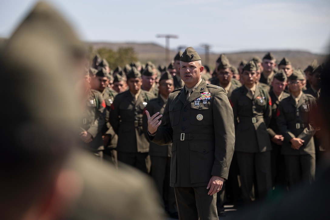 U.S. Marine Corps Col. Caleb Hyatt, commanding officer of the 11th Marine Expeditionary Unit, I Marine Expeditionary Force, speaks to Marines and Sailors with 3rd Battalion, 5th Marine Regiment, 1st Marine Division, I MEF, following a composite ceremony at Marine Corps Base Camp Pendleton, California, Aug. 22, 2025. The ceremony was held to welcome Marines and Sailors into the battalion prior to compositing with the 11th MEU. (U.S. Marine Corps photo by Cpl. Oliver Nisbet)