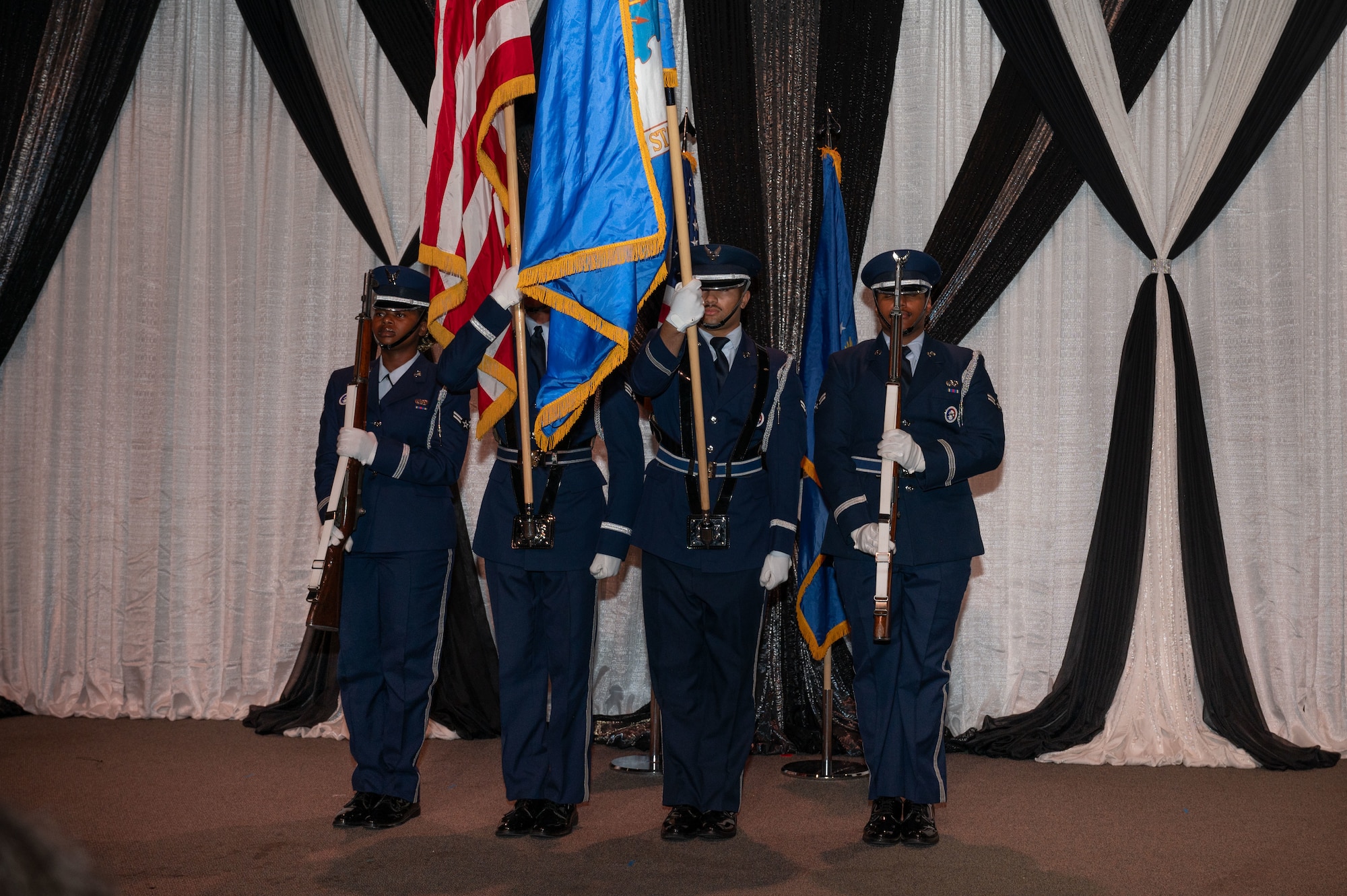 Members of the Eielson Air Force Base Honor Guard present the colors during the Eielson Air Force Base’s annual Air Force Ball in Fairbanks, Alaska, Sept. 13, 2025.