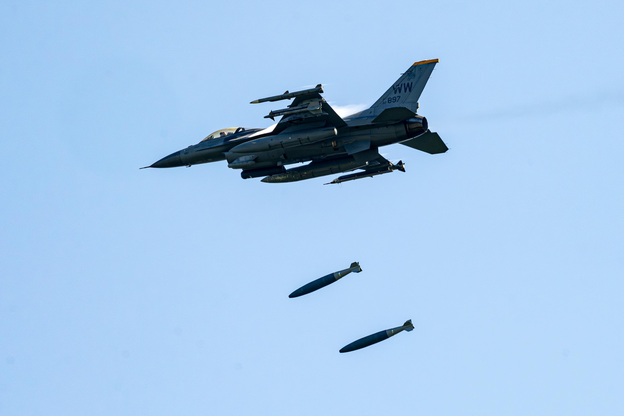 A U.S. Air Force F-16 Fighting Falcon assigned to the 14th Fighter Squadron drops inert munitions during Range Day 2025 at Draughon Range.
