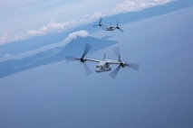 U.S. Marine Corps MV-22B Ospreys with Marine Medium Tiltrotor Squadron (VMM) 262, Marine Aircraft Group 36, 1st Marine Aircraft Wing fly in formation during exercise Resolute Dragon 25 off of the coast of Kagoshima, Japan, Sept. 12, 2025.