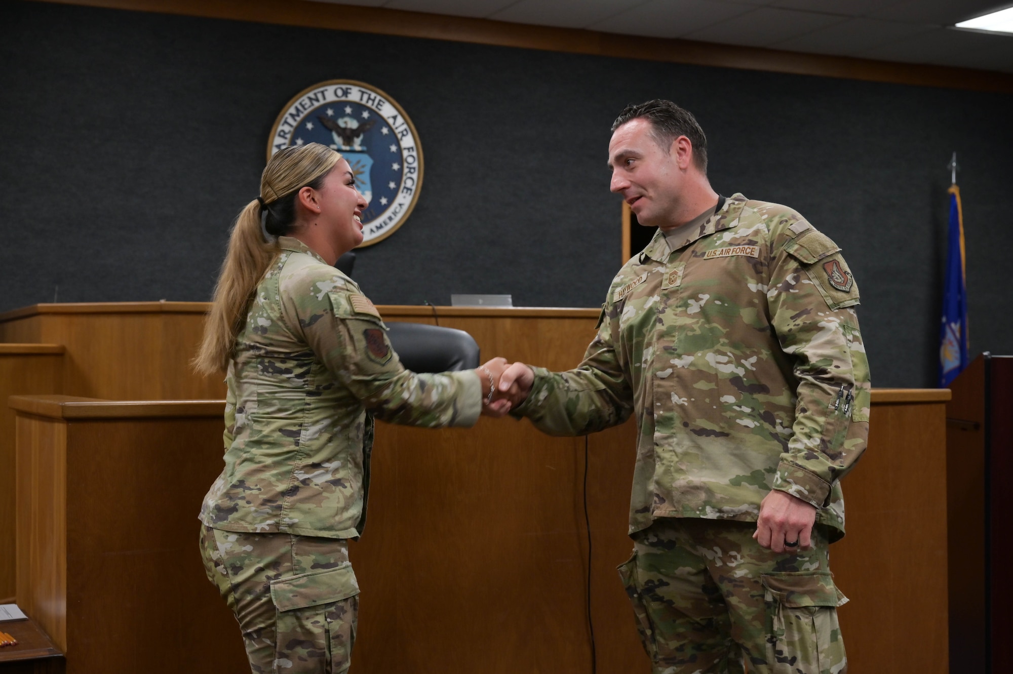 Airmen shaking hands.