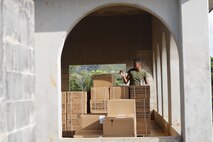 U.S. Marine Corps Cpl. Sean Harris, a food service specialist with III Marine Expeditionary Force, Information Group, takes stock of food supplies at the III MEF combat operations center in Combat Town, Camp Hansen, Okinawa Japan, Sept. 13, 2025, during the Command Post Exercise portion of Resolute Dragon 25. Resolute Dragon 25 is an annual bilateral exercise across Japan, including the southwest islands, that strengthens the command, control and multidomain maneuver capabilities of III MEF and the Japan Ground Self-Defense Force’s Western Army personnel, alongside representatives across the U.S. and Japanese Joint Force, with a focus on controlling and defending key maritime terrain. Harris is a native of Indiana. (U.S. Marine Corps photo by Gunnery Sgt. Daniel Wetzel)