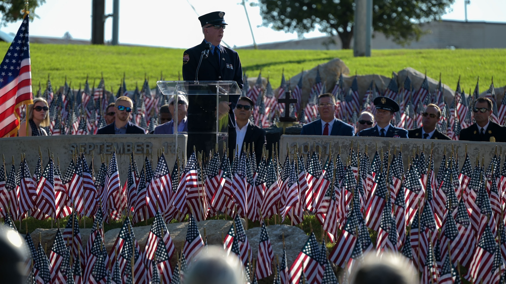 Bill Hayes, New York City Fire Department firefighter retired, speaks at the podium