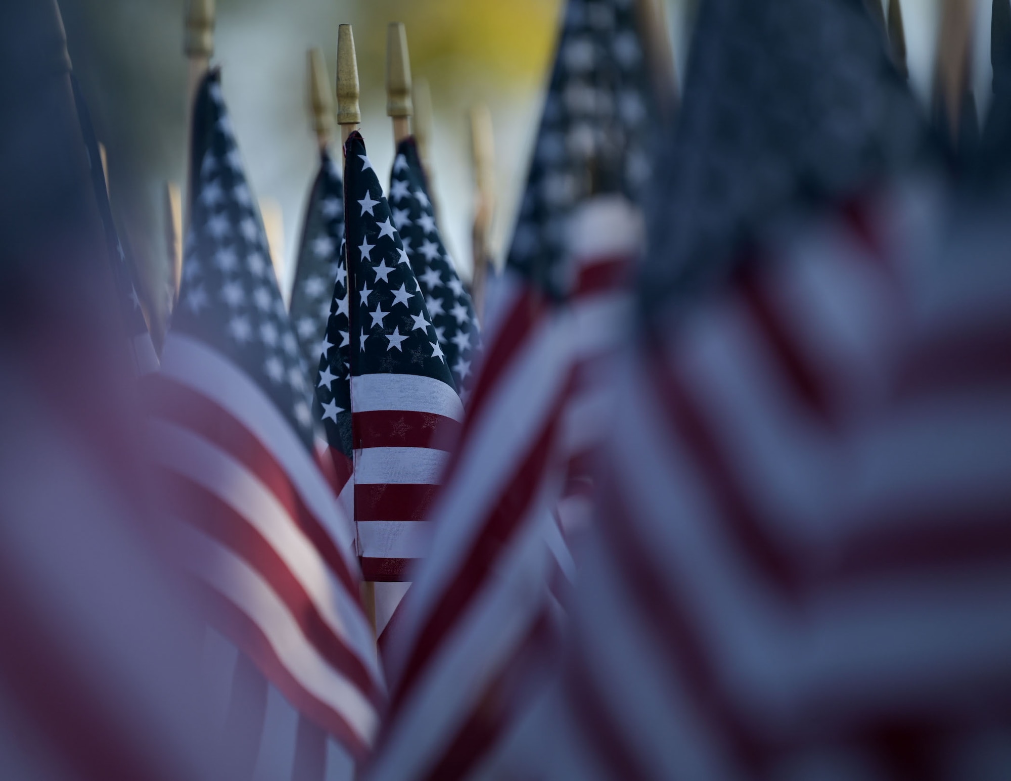Small American flags are displayed on the podium of the city of San Angelo 9/11 memorial