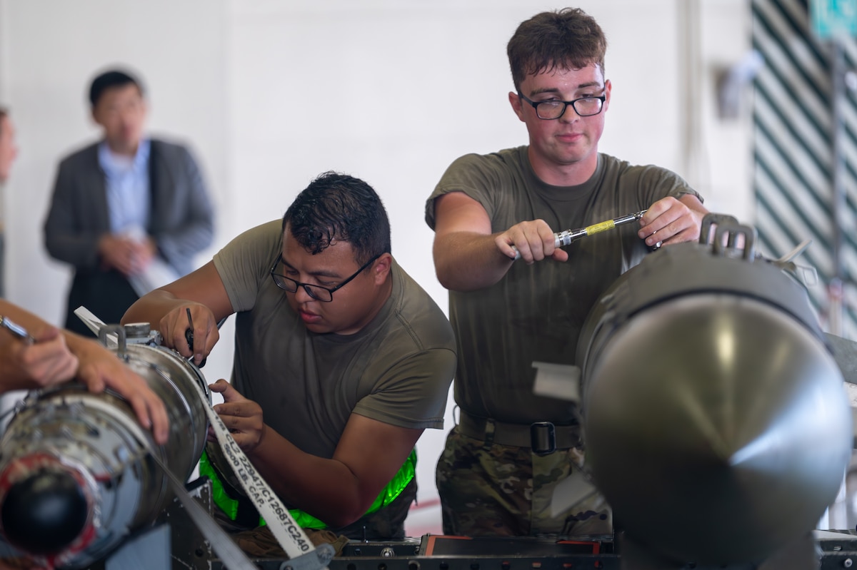 U.S. Air Force Airmen assigned to the 35th Munitions Squadron prepare munitions to be loaded onto an F-16 Fighting Falcon during a load competition at Misawa Air Base, Japan, Sept. 12, 2025.