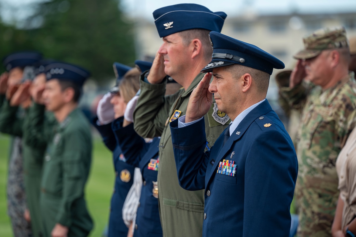 U.S. Air Force Maj. Sergio Ramos, 35th Fighter Wing chaplain, salutes during a 9/11 ceremony at Misawa Air Base, Japan. Sept. 11, 2025.
