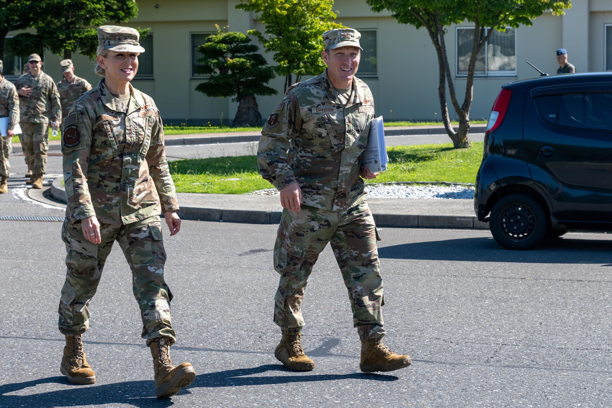 U.S. Air Force Lt. Gen. Laura Lenderman, left, Pacific Air Forces deputy commander, and Col. Paul Davidson, 35th Fighter Wing (FW) commander, walk together during a tour.