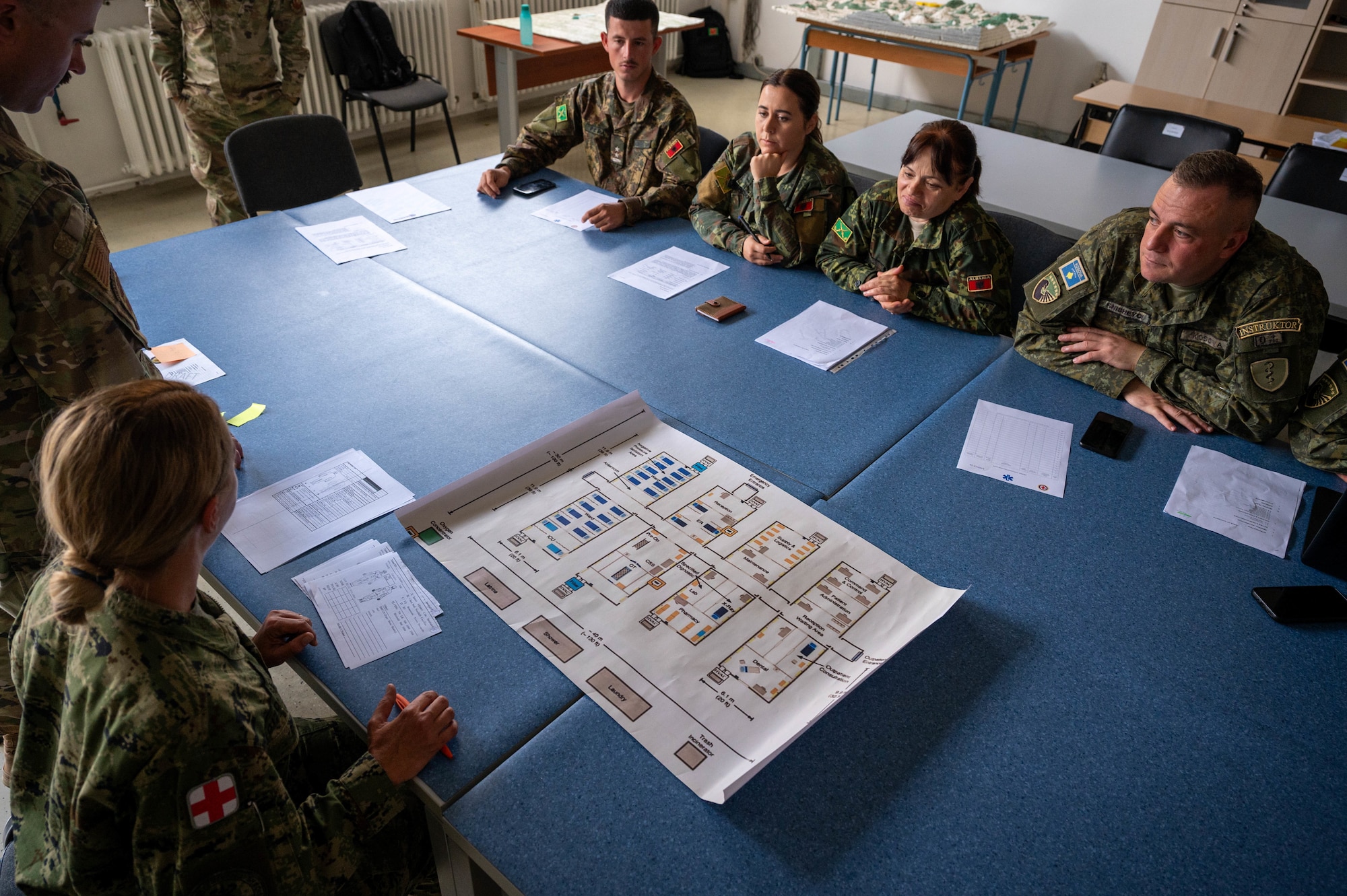 Participants discuss best practices with allies during a global health engagement at the Military Medical Center in Zagreb