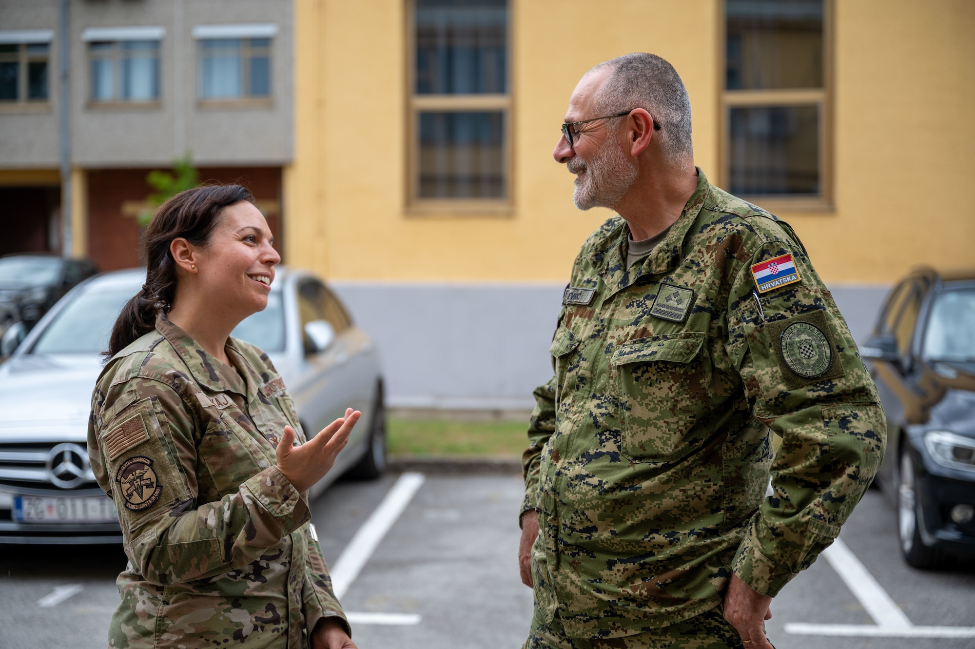 U.S. Air Force Col. Suzana M. Gjekaj, 86th Dental Squadron chief of pediatric dentistry, speaks with Col. Shime Kevric, Croatian army Role 2 medical commander, during a global health engagement at the Military Medical Center in Zagreb,