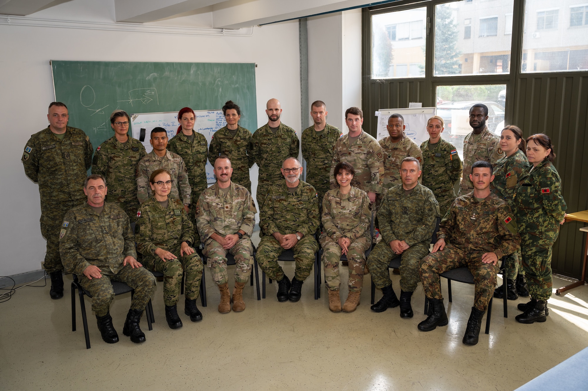 Participants in a global health engagement pose for a photo at the Military Medical Center in Zagreb