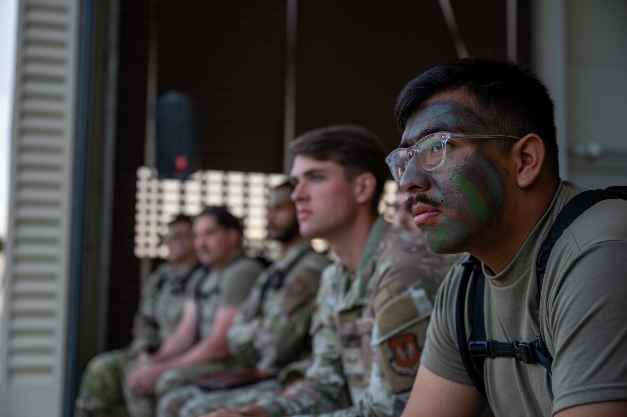 U.S. Air Force Airman 1st Class Miguel Lujan Mojica, 86th Munitions Squadron crew member, listens to an initial briefing during an exercise at Ramstein Air Base