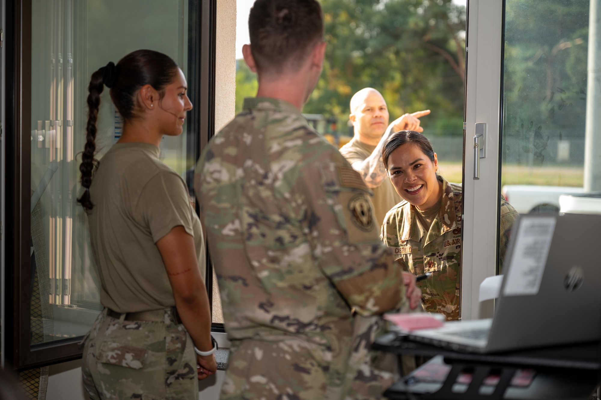 U.S. Air Force Maj. Ana Castello, 86th Munitions Squadron commander, talks to Airmen operating the command and control center for an exercise at Ramstein Air Base