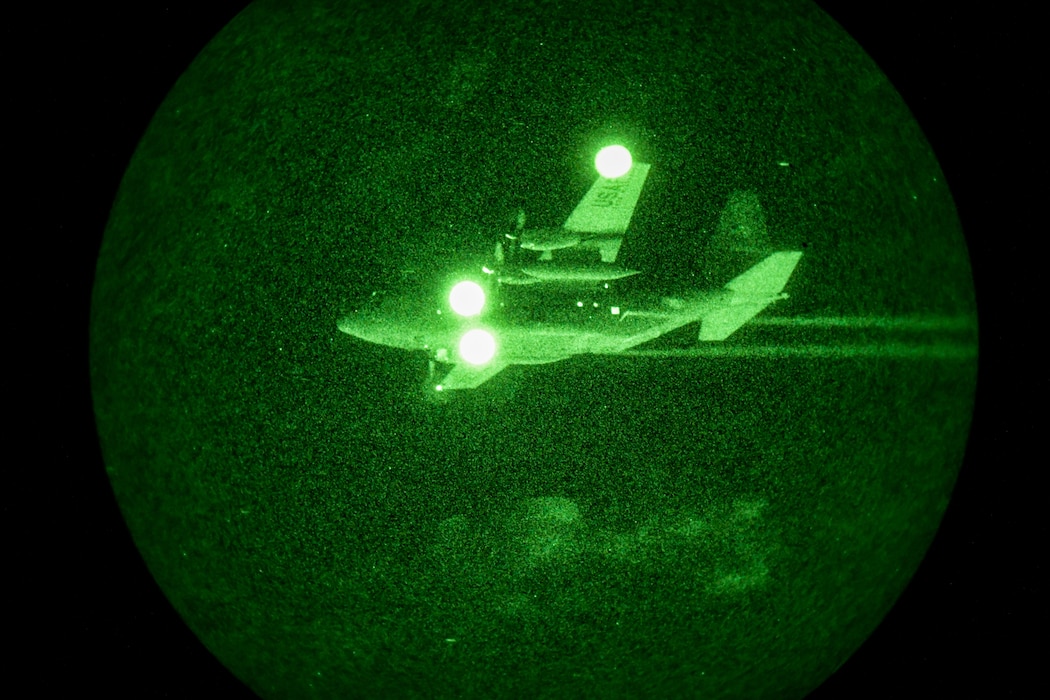 A 910th Airlift Wing aerial spray-modified C-130H Hercules aircraft disperses mosquito control product, Sept. 9, 2025, over the marsh areas of the Naval Weapons Station, Joint Base Charleston, South Carolina.