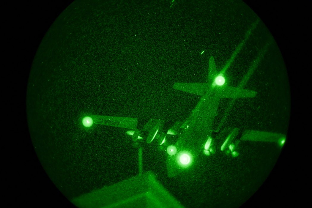 A 910th Airlift Wing aerial spray-modified C-130H Hercules aircraft disperses mosquito control product, Sept. 9, 2025, over the marsh areas of the Naval Weapons Station, Joint Base Charleston, South Carolina.