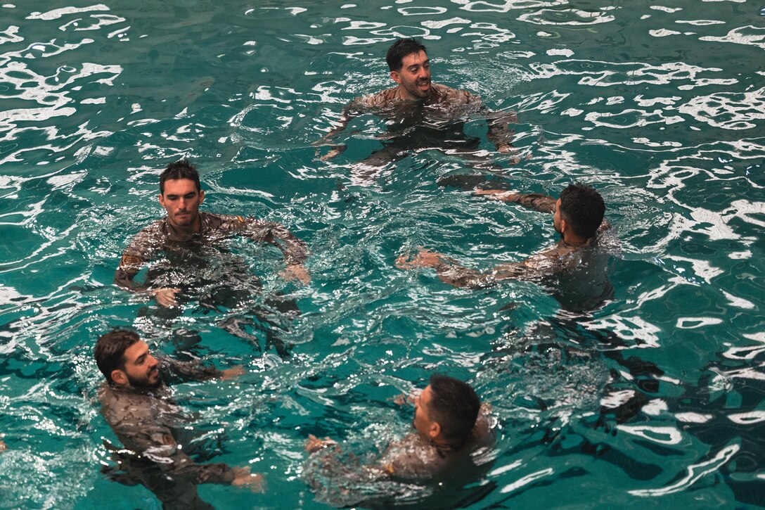 Reconnaissance marines with Infantería de Marina (Spanish marine corps) tread water during water survival training as part of UNITAS 2025 at Marine Corps Base Camp Lejeune, North Carolina, Sep. 15, 2025. UNITAS, which is Latin for “unity,” was conceived in 1959 and has taken place annually since first conducted in 1960. This marks the 66th iteration of the world’s longest running annual multinational maritime exercise. (U.S. Marine Corps photo by Sgt. Jorge Borjas)
