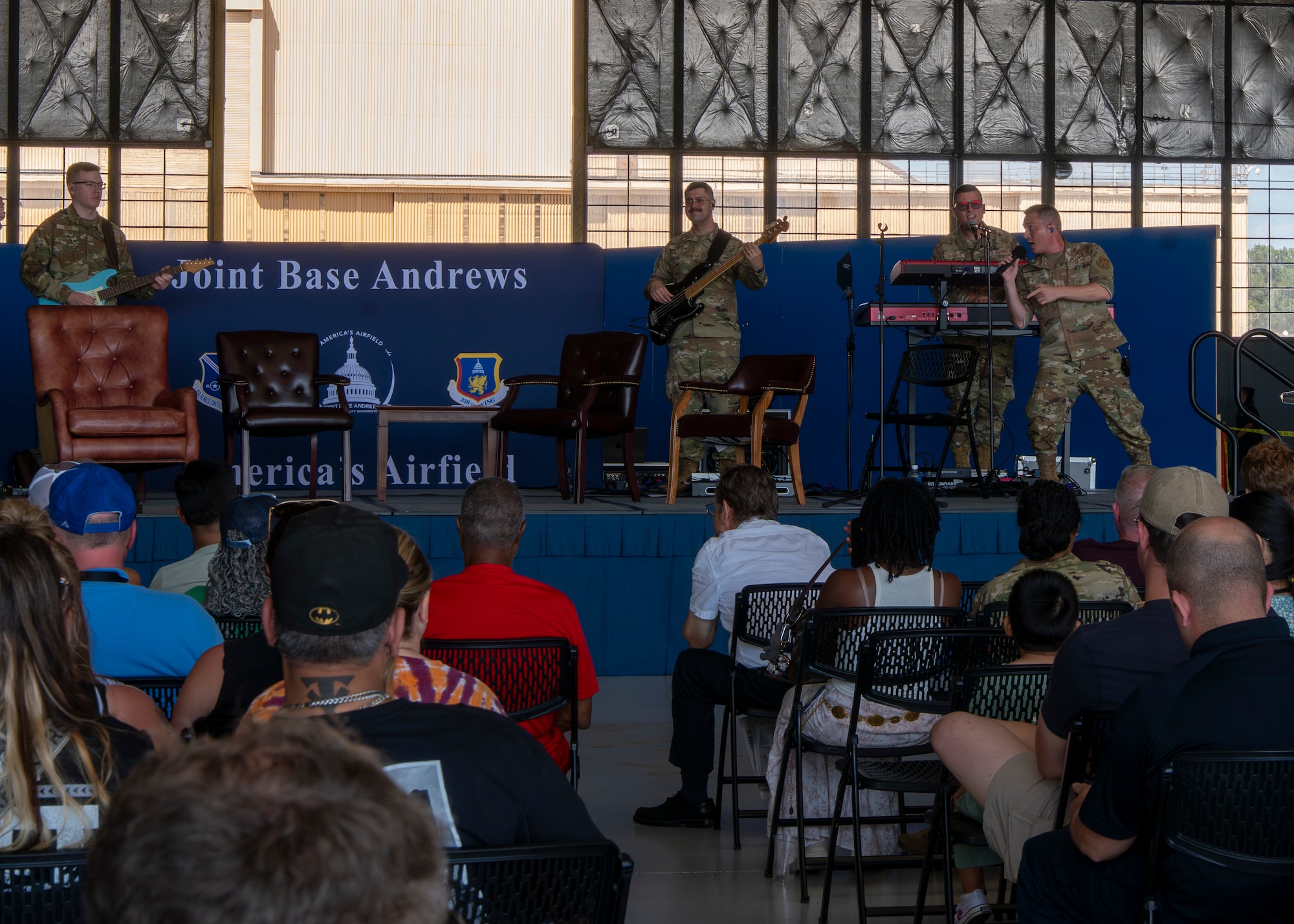 Max Impact, one of six ensembles of The U.S. Air Force Band, performs during the 2025 Joint Base Andrews Air Show at Joint Base Andrews, Maryland, Sept. 13, 2025. The air show features U.S. military and civilian aerial demonstrations, static displays, and opportunities for the public to engage with service members, honoring the legacy of aviation excellence while inspiring the next generation of aviators and aerospace innovators. (U.S. Air Force photos by Staff Sgt. Kimberly Barrera)