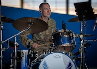 Max Impact, one of six ensembles of The U.S. Air Force Band, performs during the 2025 Joint Base Andrews Air Show at Joint Base Andrews, Maryland, Sept. 13, 2025. The air show features U.S. military and civilian aerial demonstrations, static displays, and opportunities for the public to engage with service members, honoring the legacy of aviation excellence while inspiring the next generation of aviators and aerospace innovators. (U.S. Air Force photos by Staff Sgt. Kimberly Barrera)