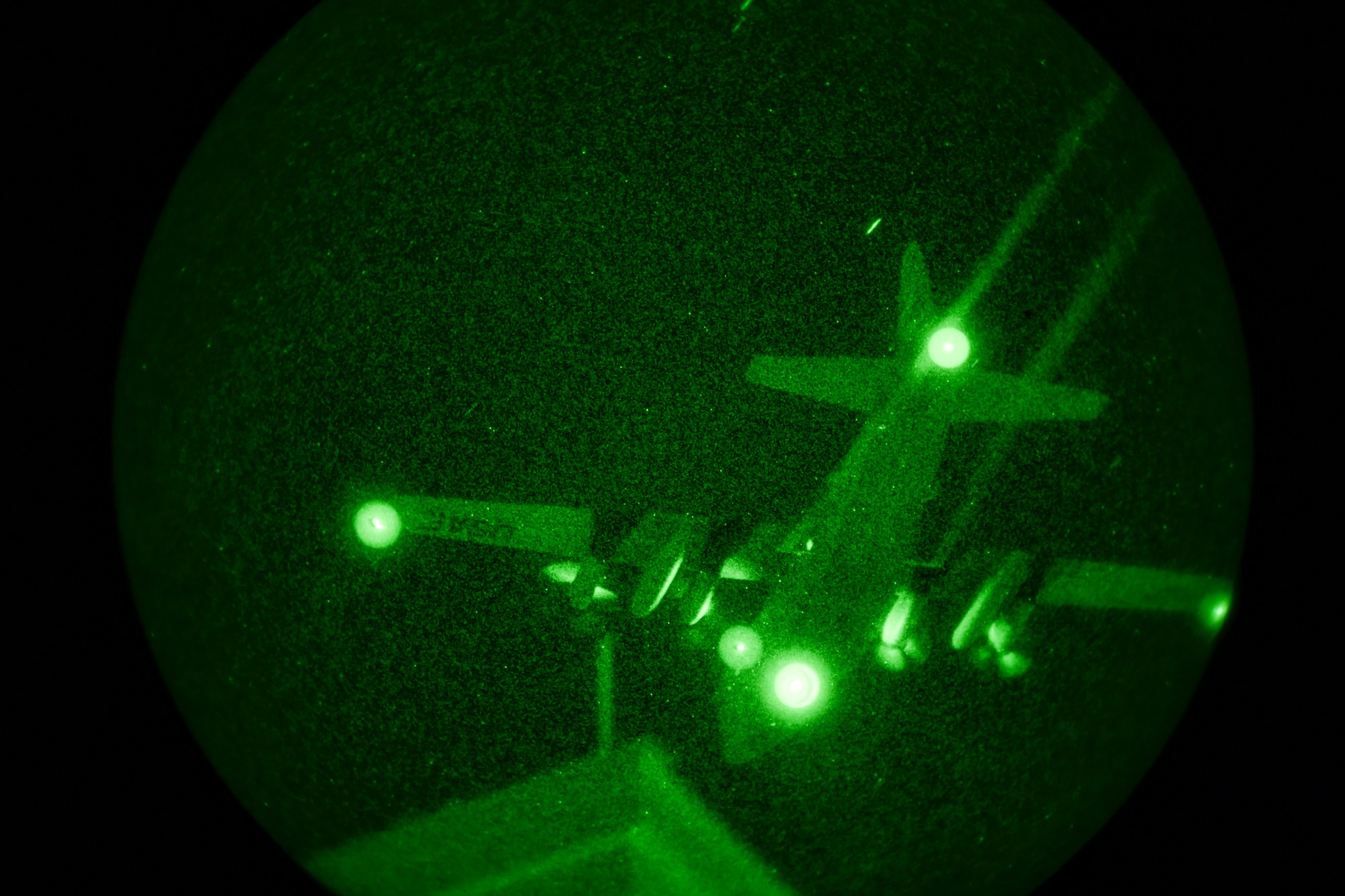 A 910th Airlift Wing aerial spray-modified C-130H Hercules aircraft disperses mosquito control product, Sept. 9, 2025, over the marsh areas of the Naval Weapons Station, Joint Base Charleston, South Carolina.