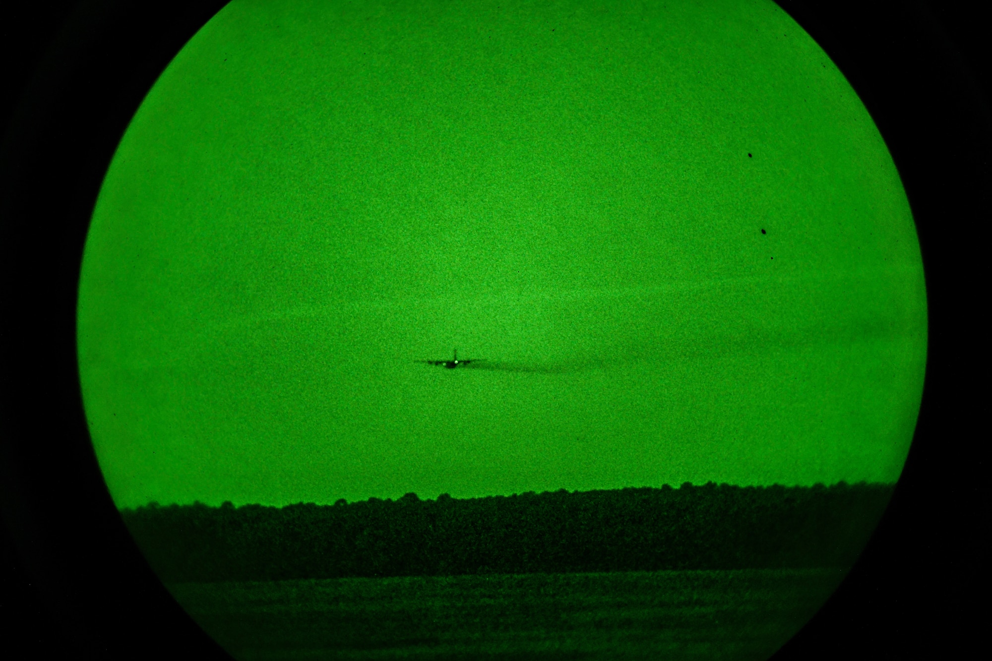 A 910th Airlift Wing aerial spray-modified C-130H Hercules aircraft disperses mosquito control product, Sept. 9, 2025, over the marsh areas of the Naval Weapons Station, Joint Base Charleston, South Carolina.