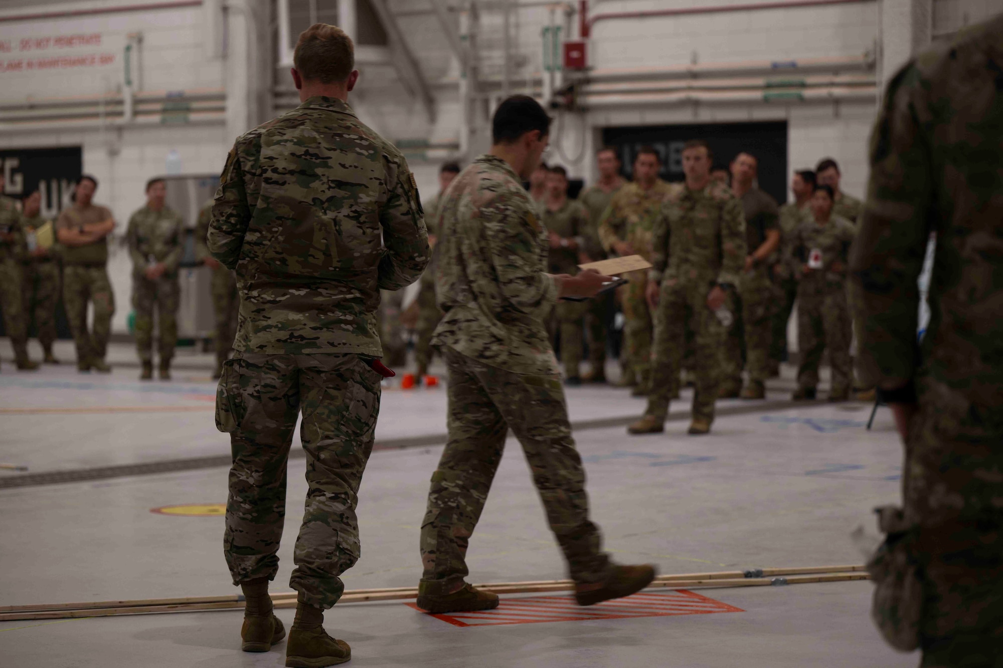 U.S. Air Force Air Commandos assigned to Air Force Special Operations Command, conduct mission planning during Emerald Warrior 25.2 at Marine Corps Air Station Yuma, Arizona, July 27, 2025.