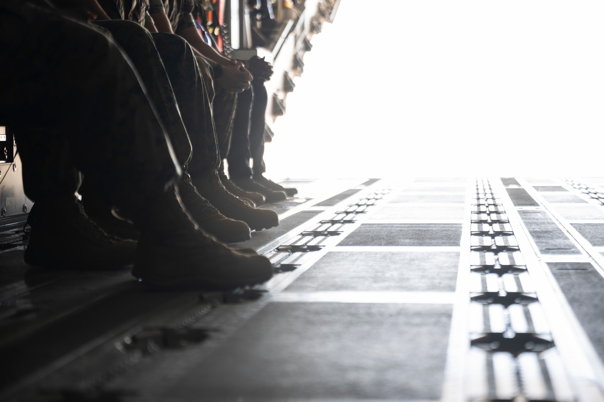 U.S. Air Force Airmen and U.S. Marine Corps Marines prepare for an orientation flight aboard a Royal Air Force A-400 Atlas during Emerald Warrior 25.2 at Marine Corps Air Station Yuma, Arizona, Aug 1, 2025.