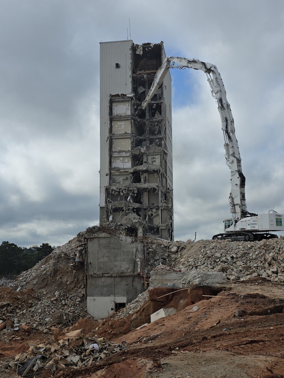 A multi-storied facility being torn down.
