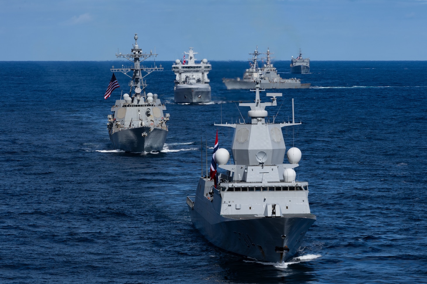 From front, Norwegian Navy Frigate HNoMS Thor Heyerdahl (F314), Arleigh Burke-class guided-missile destroyer USS Bainbridge (DDG 96), Norwegian Navy replenishment oiler HNoMS Maud (A 530), Arleigh Burke-class guided-missile destroyers USS Mahan (DDG 72) and USS Winston S. Churchill (DDG 81), and fast-combat support ship USNS Supply (T-AOE 6), sail in formation, Aug. 23, 2025.