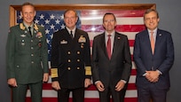 From left: Gen. Eirik Kristoffersen, Norwegian Chief of Defence, Adm. Stuart B. Munsch, commander, U.S. Naval Forces Europe-Africa, Espen Barth Eide, Norwegian Minister of Foreign Affairs, and Eric Meyer, Chargé d'Affaires at the U.S. Embassy in Oslo, pose for a photo aboard the world’s largest aircraft carrier USS Gerald R. Ford (CVN 78), during its scheduled port call to Oslo, Norway, Sept. 13, 2025.