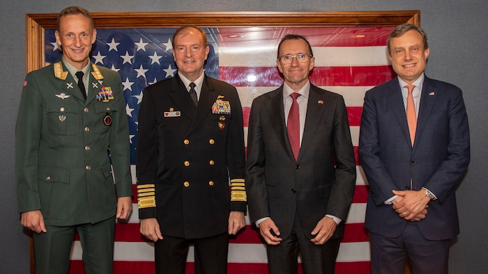 From left: Gen. Eirik Kristoffersen, Norwegian Chief of Defence, Adm. Stuart B. Munsch, commander, U.S. Naval Forces Europe-Africa, Espen Barth Eide, Norwegian Minister of Foreign Affairs, and Eric Meyer, Chargé d'Affaires at the U.S. Embassy in Oslo, pose for a photo aboard the world’s largest aircraft carrier USS Gerald R. Ford (CVN 78), during its scheduled port call to Oslo, Norway, Sept. 13, 2025.