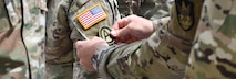1st Space Battalion Soldiers receive combat patches