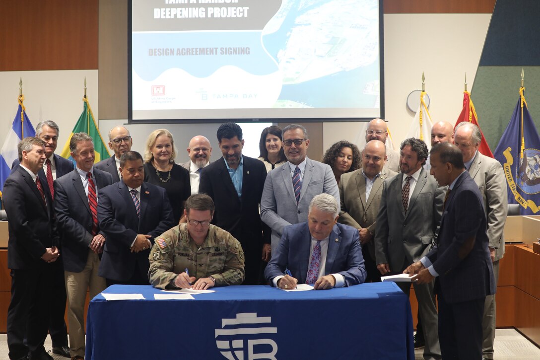 Col. Brandon Bowman, Commander, Jacksonville District, and Mr. Paul Anderson, President and Chief Executive Officer, Port Tampa Bay sign the Preconstruction Engineering and Design Agreement during a ceremony held at the port today.