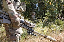 The team at Small Arms Fire Control (SAFC) has met a multitude of achievements in
the last few months with their new Family of Weapon Sights-Sniper (FWS-S) system.
The FWS-S system is mounted in-line with a sniper’s day optic on the M110A1 Squad
Designated Marksman Rifle (SDMR) and the MK22 Precision Sniper Rifle (PSR). The
FWS-S provides the sniper with infrared (thermal) imagery in all weather conditions,
through obscurants, and under all lighting conditions.
