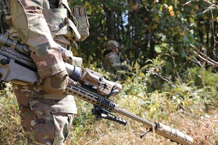 The team at Small Arms Fire Control (SAFC) has met a multitude of achievements in
the last few months with their new Family of Weapon Sights-Sniper (FWS-S) system.
The FWS-S system is mounted in-line with a sniper’s day optic on the M110A1 Squad
Designated Marksman Rifle (SDMR) and the MK22 Precision Sniper Rifle (PSR). The
FWS-S provides the sniper with infrared (thermal) imagery in all weather conditions,
through obscurants, and under all lighting conditions.