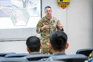 U.S. Air Force Lt. Col. Phillip Vaughn, Expeditionary Task Group commander (SOCSOUTH), supports Ecuadorian military partners during a tabletop exercise, enhancing interoperability and crisis response planning, August 25, 2025. The engagement was intended to strengthen regional security cooperation.