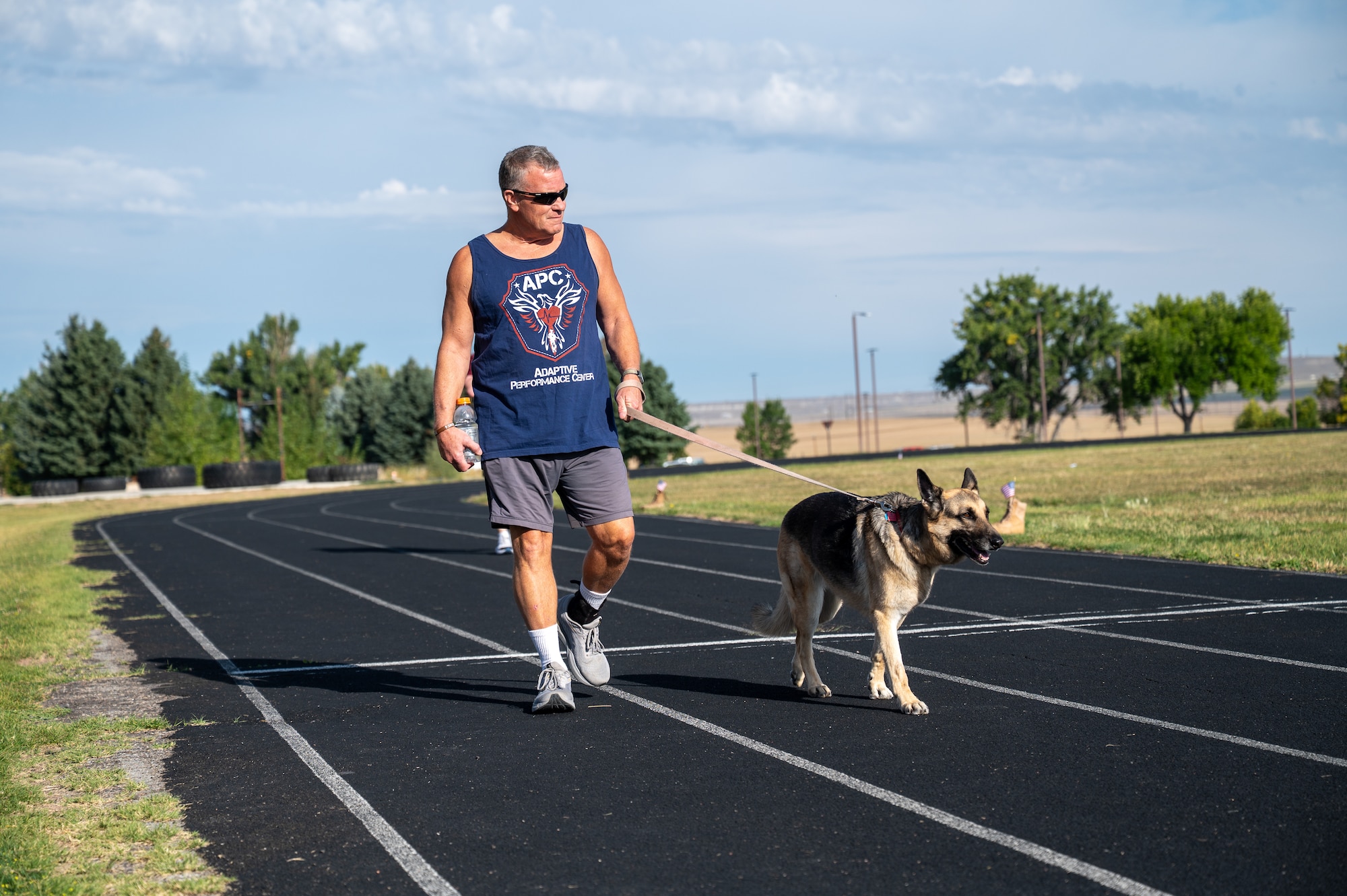 A man walks his dog
